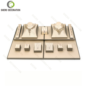 Expositor de joyería de cuero PU color champán con logotipo personalizado, soporte para collares, anillos y pendientes para mostrador de tienda de joyería. - Product Image 1