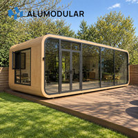 Bâtiment modulaire préfabriqué avec revêtement en aluminium imitation bois, espace pour magasin commercial, salle d'exposition, solution clé en main
