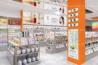 Table de présentation cosmétique LED écologique 02-DYaS032 avec armoire de rangement pour les magasins de soins de la peau et de maquillage, design d'intérieur