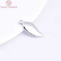 Vente en gros de pendentifs en laiton plaqué or champagne 24 carats de haute qualité, en forme d'ailes d'ange, tendance, pour la fabrication de bijoux DIY de haute qualité