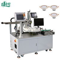 Machine de marquage laser à fibre avec couverture en plastique et positionnement visuel pour abat-jour LED, positionnement rotatif et découpe de matériaux par bras robotique