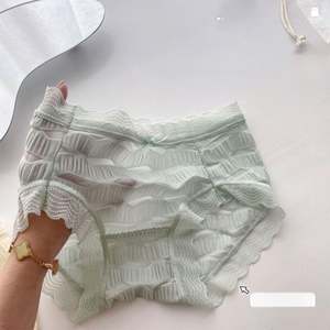 Braguitas Adhesivas Florales Transpirables de Cintura Baja con Soporte Abdominal - Product Image 1