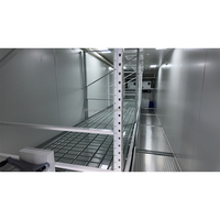 Système hydroponique de culture en conteneur sur roulettes avec structure en acier et éclairage LED optimisé pour la culture de micro-légumes et de cultures rapides en agriculture verticale