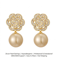Boucles d'oreilles pendantes hypoallergéniques et étanches en forme de fleur avec zircon baguette plaqué or 18 carats et perle champagne, idéales pour mariages et occasions spéciales 2026
