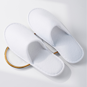 Zapatillas de hotel de tela de felpa gruesa a granel, zapatillas blancas cómodas de lujo desechables para logotipo personalizado - Product Image 1