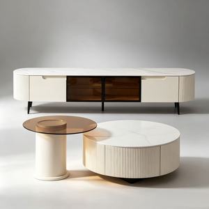 Ensemble de meuble TV moderne blanc cannelé et table basse ronde avec portes en verre ambré pour salon d'appartement - Product Image 1