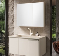 Meuble mural personnalisable haut de gamme en bois avec lavabo en céramique, miroir et rangement multi-tiroirs pour la rénovation de salles de bain de luxe