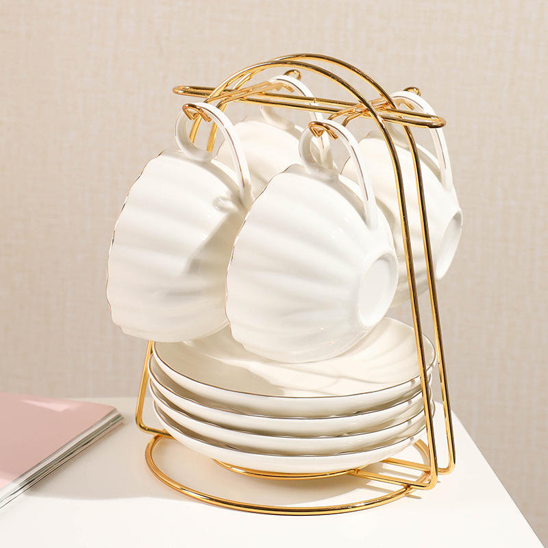 Pumpkin White 4-Piece Cup and Saucer Set