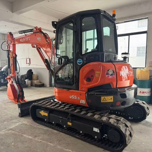 Mini-excavatrice Kubota U55-5 de 5,5 tonnes avec godet de terrassement d'une capacité de 0,17 m³, couleur orange, équipement de construction d'occasion - Product Image 4
