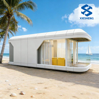Nouvelle maison conteneur préfabriquée de l'usine source pour l'expédition mondiale, capsule spatiale modulaire démontable, respirante, moderne, hôtel-villa