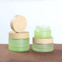 Bouteille de toner en verre cosmétique verte de marque privée impression en soie pot de lotion vide de luxe finition mate bouchon à vis sérum de soin de la peau