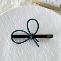Pince à cheveux Qianjin en acétate avec nœud papillon et fleur, mignonne, haut de gamme, avec étiquette dorée, nouveau style moderne