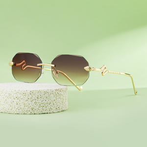 Nuevas Gafas de Sol sin Marco Estilo Europeo Americano para Mujer, Diseño de Cabeza de Serpiente con Borde de Corte de Diamante, Protección UV400, Marco de Aleación de Zinc - Product Image 4