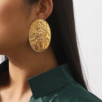 Boucles d'oreilles ovales en alliage exagéré de style simple Boucle d'oreille de mode métallique géométrique texturée pour femme