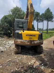 Mini-excavatrice sur chenilles Hyundai 90 9T sud-coréenne haute performance, capacité de la benne de 0,39 m³, puissance de 7,6 kW, compacte, pour travaux d'aménagement paysager - Product Image 3