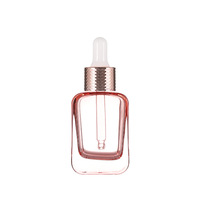 Flacon compte-gouttes en verre de 30 ml, carré arrondi, sérigraphié, pour cosmétiques, soins de la peau, huiles essentielles, essence de rose dorée, vente en gros
