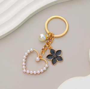 Porte-clés en alliage parfumé avec perle de style mode et pendentif camélia, décoration de sac à main pour fille, cadeau pour petite amie - Product Image 6