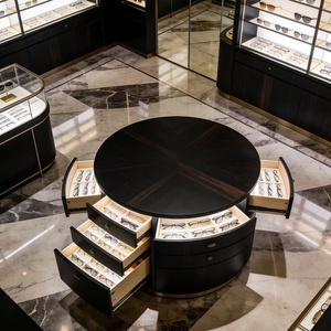 Ensemble d'agencements de magasin d'optique de luxe personnalisable avec éclairage LED en verre trempé, design durable - Meubles muraux ronds pour îlot central - Product Image 2