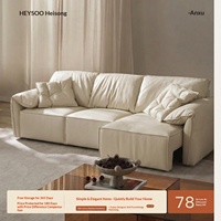 Canapé fonctionnel en cuir véritable Saffiano noir, style Bauhaus français, trois places, oreilles d'éléphant, nouveau modèle 2026, pour salon de villa, électrique