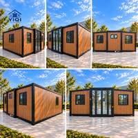 Maison extensible de 20 pieds avec extérieur imitation bois, cabane moderne et portable pour projets de villégiature et de vacances