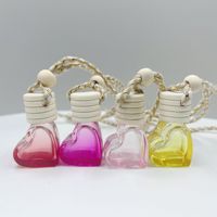 Flacon diffuseur de parfum pour voiture en verre en forme de cœur de 5 ml, vide et rechargeable, pour huiles essentielles, à suspendre, pour la décoration