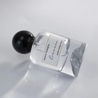 Flacon d'échantillon de parfum sphérique noir en verre de 30 ml avec bouchon à vis, personnalisable, portable, vide, avec pompe pulvérisatrice – En stock