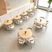 Ensemble de mobilier commercial Ron Group pour café et restaurant : table en bois, banquette rembourrée en tissu, chaise en bois massif