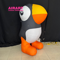Pingouin gonflable décoratif de Noël, dessin animé gonflable de pingouin arctique pour l'événement de festival