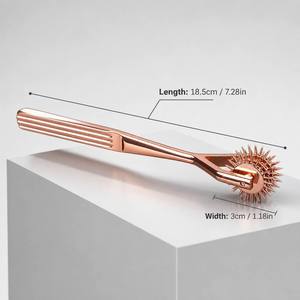 Rouleau de massage professionnel de luxe en or rose à triple rangée de roulettes Wartenberg pour test sensoriel des nerfs, BDSM, spa et bien-être - Product Image 3