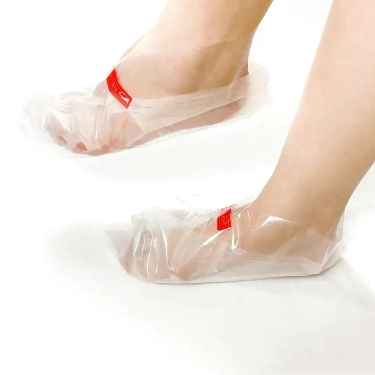 Cilt bakımı su geçirmez ayak koruyucu plastik çorap yetişkinler için tek kullanımlık şeffaf hiçbir sıvı plastik PP ayak maskesi