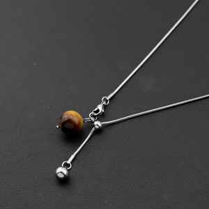 Collier tendance en acier titane avec pendentif œil de tigre, simple et élégant, pour femme, vente en gros de bijoux - Product Image 5