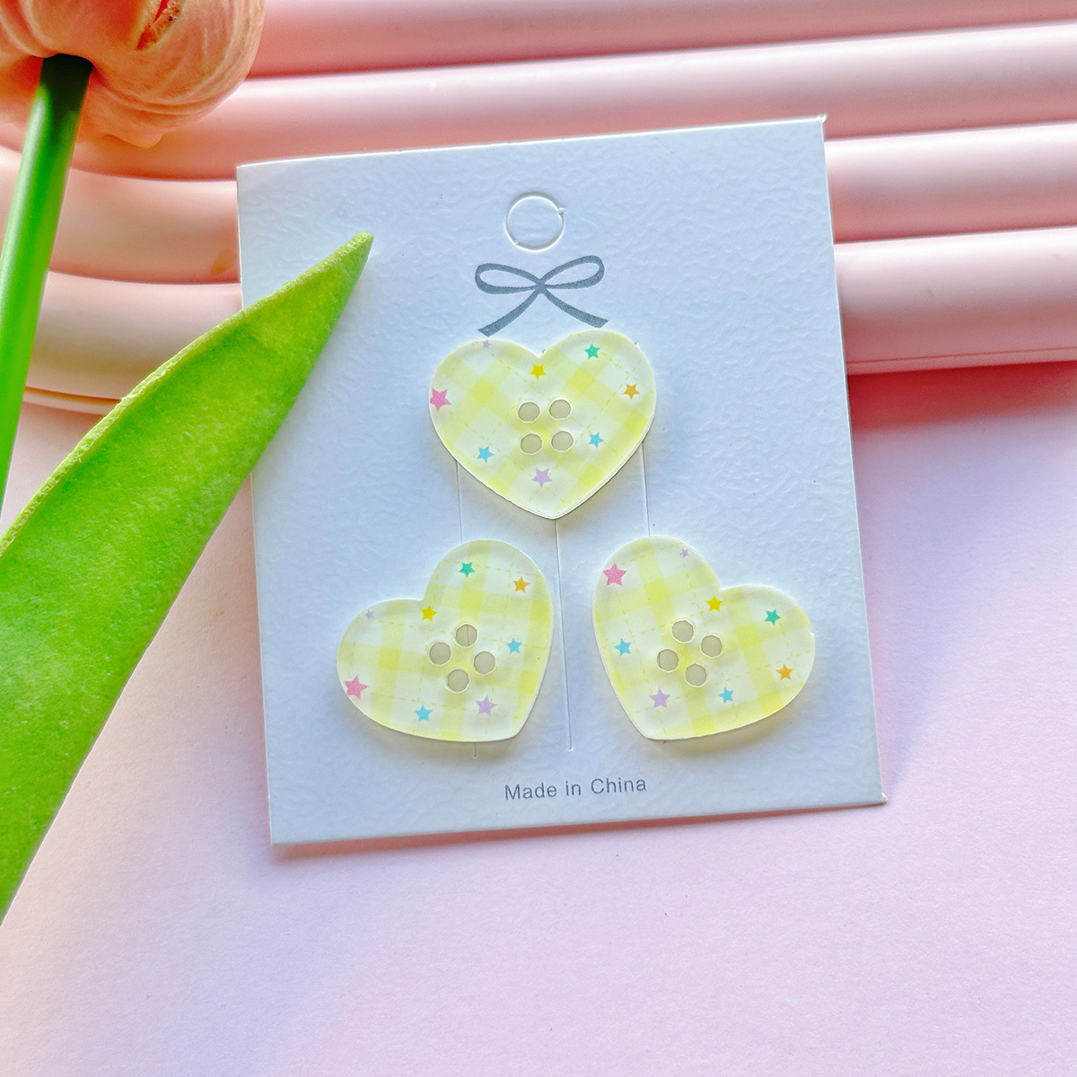 Bouton Love jaune 24*19mm