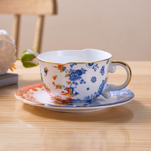 Taza y Platillo de Café de Porcelana China Estilo Nuevo - Asa Pintada en Oro, Loto Azul Blanco - Product Image 3