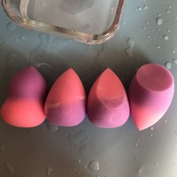 Mélangeur de maquillage magique en gros éponge de maquillage à couleur changeante bouffée cosmétique douce sans latex en rose