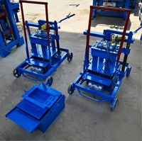 Petites idées d'entreprise gagner de l'argent machine à briques en béton moteur électrique/diesel QMY2-45 mini machine à fabriquer des blocs creux