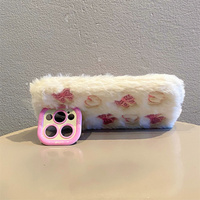 Coque de téléphone en peluche moelleuse avec nœud et cœur brodés, pour iPhone 17 Pro Max 16 15 14 13, avec cadre de protection mignon pour appareil photo