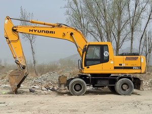 Pelle sur pneus multifonction d'origine d'occasion Hyundai 210W-7 Pelle KomatsuCATShyundai à haut rendement en bon état en vente - Product Image 6