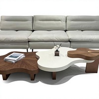 Table basse en bois massif style nuage crème à plateau irrégulier en dalle de roche, design haut de gamme pour salon, usage domestique