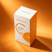 Boîte pliante de luxe pour produits de soin de la peau, sérum éclaircissant à la vitamine C 30 ml avec laminage mat, gaufrage et doublure en éponge