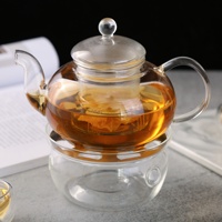 Théière en verre transparent résistant à la chaleur en borosilicate de grande capacité au design moderne avec infuseur amovible