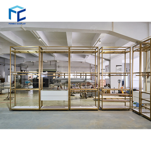 Thiết kế hiện đại kim loại vàng sáng bóng bán lẻ hàng may mặc hiển thị Kệ vàng quần áo hiển thị kệ cho quần áo cửa hàng trang trí - Product Image 2