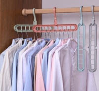 Porte-vêtements pliable multifonctionnel en plastique à 9 emplacements, gain de place, rangement domestique, cintres magiques de voyage, cintre créatif pour vêtements