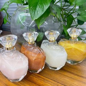 น้ำมันประกายผิววีแกนสำหรับแบรนด์ส่วนตัว ไฮไลท์เตอร์เนื้อลิควิดสำหรับผิวกายและใบหน้า สเปรย์กลิตเตอร์น้ำหอมเพิ่มความเปล่งประกาย น้ำมันประกายผิว - Product Image 1