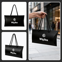 Emballage de perruques haut de gamme écologique en boîte coussin avec doublure en éponge, impression personnalisée sur film métallisé, poignée et logo sur mesure