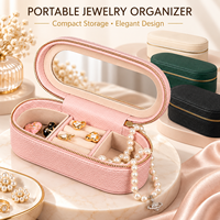 Boîte à bijoux ovale en cuir PU la plus vendue, avec fermeture éclair, multifonctionnelle, portable, miroir intégré, couleur personnalisable, pour boucles d'oreilles et bagues