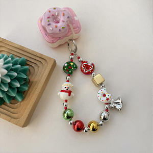 ¡Dios Mío! Esta Cadena para Teléfono con Forma de Donut de Muñeco de Nieve se Está Volviendo Tan Adorable - Product Image 3