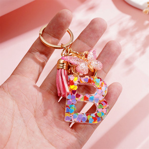Llavero de resina con letras y borla de mariposa, colgante colorido para bolso con alfabeto, accesorio de joyería DIY - Product Image 3