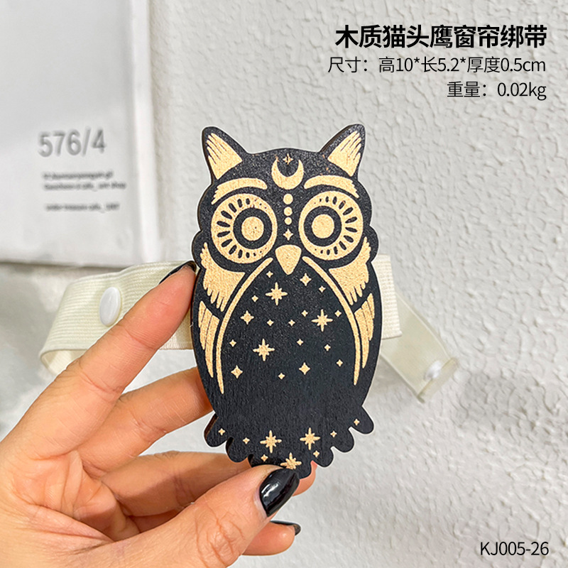 Wooden owl curtain tie