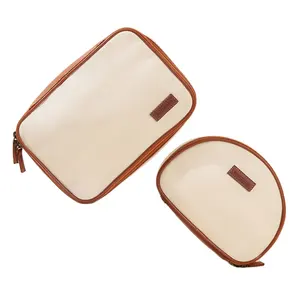 थोक कस्टम डिजाइन लोगो गुणवत्ता ठीक सादे कपास कैनवास पाउच पु चमड़े splicing Toiletry यात्रा मेकअप कॉस्मेटिक बैग