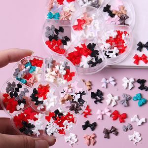 Oferta Especial: Nuevo Set de Arte de Uñas Estilo Japonés, Mixto 3D, Paquete de 7 Compartimentos, Dijes de Resina para Uñas con Diseños de Mariposas, Lazos y Osos de Dibujos Animados - Product Image 1